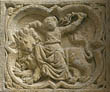 Panel 02:04 - Woman with a whip riding side-saddle on a lion